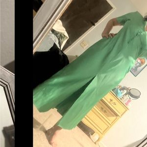 Green satin light dress not sure what material it is